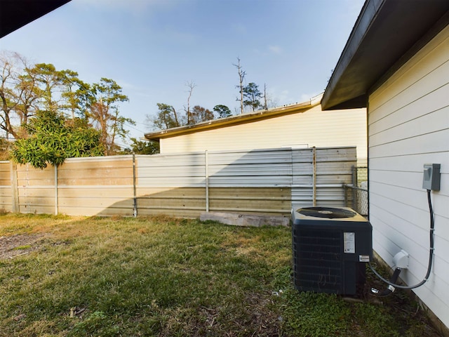 5260 Landry Ln, Beaumont, TX 77708 - view of yard featuring fence and central AC unit