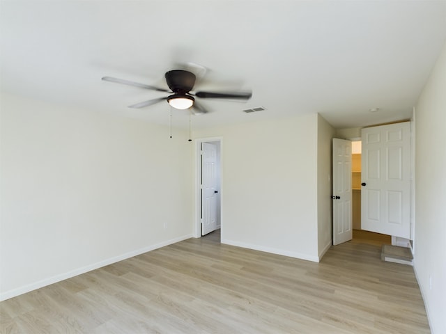 5260 Landry Ln, Beaumont, TX 77708 - empty room with baseboards, light wood-style flooring, visible vents, and a ceiling fan