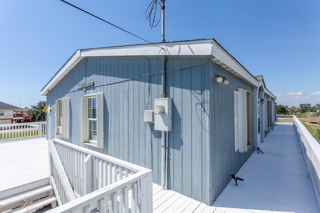 view of side of home featuring a deck