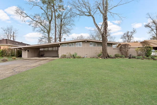 single story home with a carport and a front yard