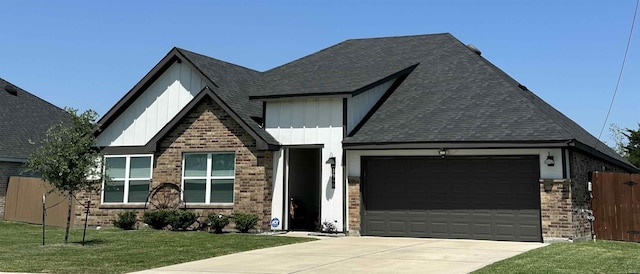 3040 Allie Payne, Orange, TX 77632 - view of front of home featuring board and batten siding, a garage, brick siding, a shingled roof, and driveway