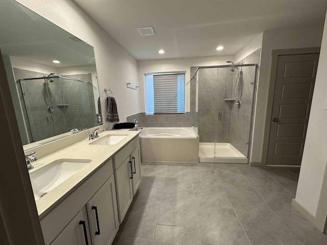 3040 Allie Payne, Orange, TX 77632 - bathroom featuring a sink, a bath, double vanity, and a stall shower