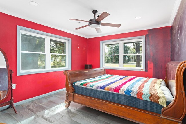 bedroom featuring ceiling fan and crown molding