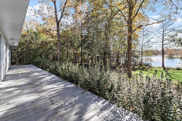 wooden terrace with a water view