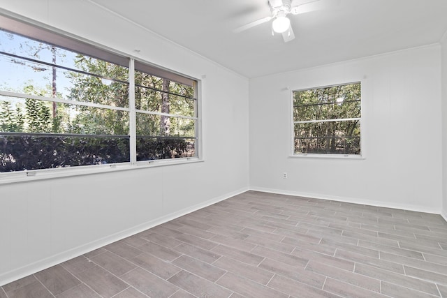 unfurnished room with light hardwood / wood-style floors and ceiling fan