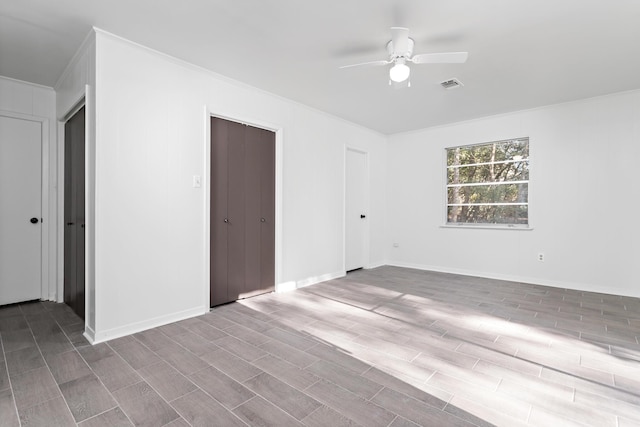 unfurnished room featuring ceiling fan