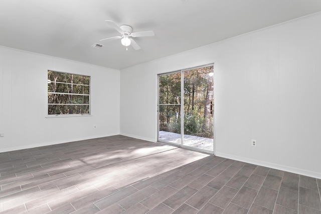 empty room featuring ceiling fan