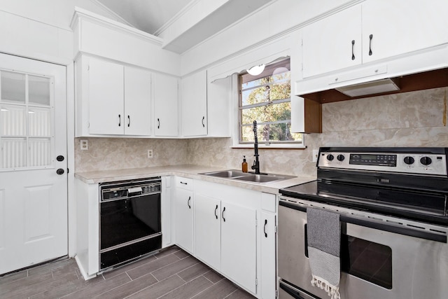 kitchen with dishwasher, white cabinets, electric stove, sink, and decorative backsplash