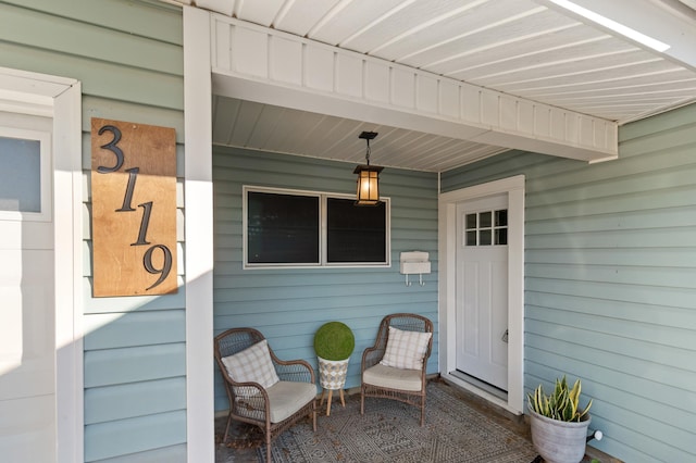 doorway to property with a porch