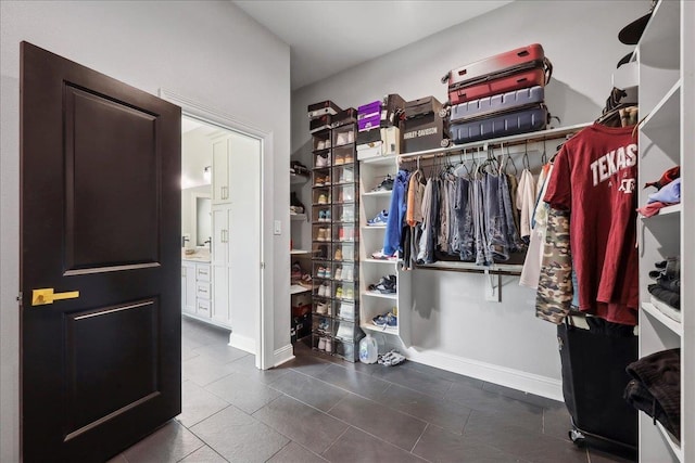 walk in closet featuring tile patterned floors