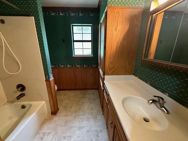 bathroom with shower / bathing tub combination and vanity