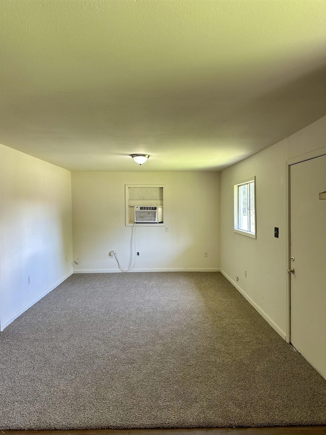 2910 Dowling St, Orange, TX 77630 - unfurnished room featuring dark colored carpet and baseboards