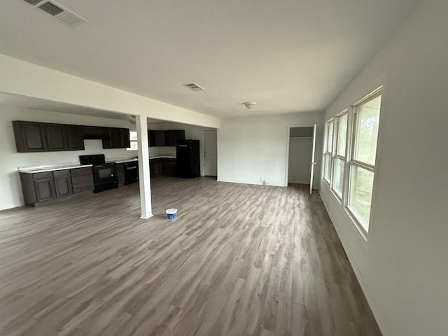 3190 Shivers St, Vidor, TX 77662 - unfurnished living room with wood finished floors