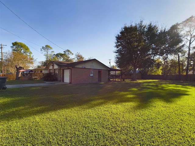 view of yard with a garage