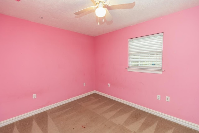 970 Charleston Cir, Bridge City, TX 77611 - unfurnished room with carpet floors, a textured ceiling, and ceiling fan