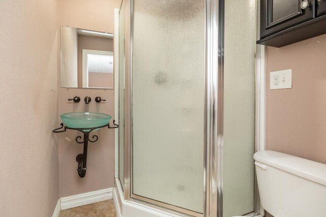 970 Charleston Cir, Bridge City, TX 77611 - full bathroom with a stall shower and tile patterned flooring