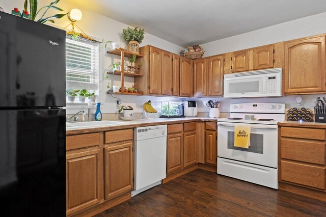 1165 Archie St, Vidor, TX 77662 - kitchen featuring white appliances, a sink, light countertops, open shelves, and dark wood-type flooring