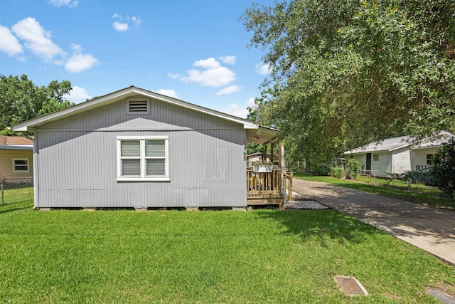 1165 Archie St, Vidor, TX 77662 - view of side of property with driveway