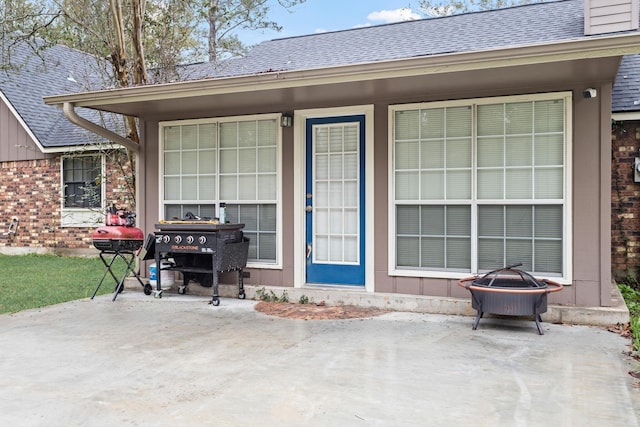 property entrance with a patio