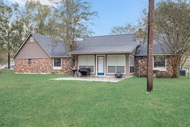 back of house with a yard