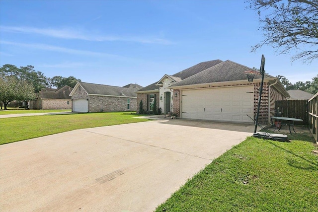 ranch-style home featuring a garage and a front yard