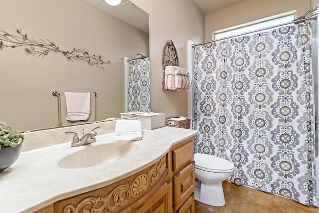 full bathroom featuring vanity, tile patterned flooring, toilet, and curtained shower