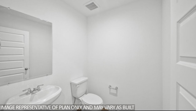 1670 Haidlyns Way, Sour Lake, TX 77659 - bathroom with toilet and a sink