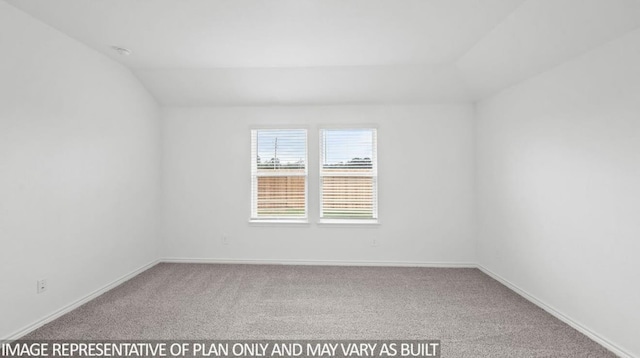 1670 Haidlyns Way, Sour Lake, TX 77659 - carpeted empty room featuring vaulted ceiling, baseboards, and a smoke detector