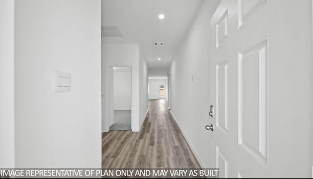 1670 Haidlyns Way, Sour Lake, TX 77659 - hall with wood finished floors, recessed lighting, and baseboards