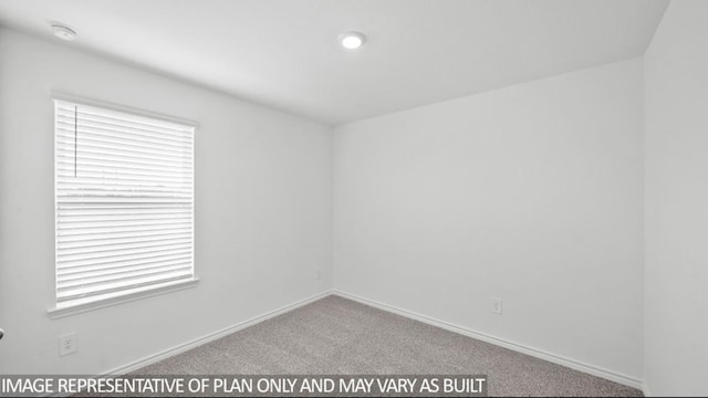 1670 Haidlyns Way, Sour Lake, TX 77659 - carpeted empty room with baseboards, plenty of natural light, and a smoke detector