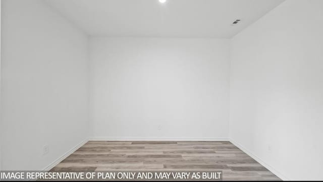 1670 Haidlyns Way, Sour Lake, TX 77659 - empty room with wood finished floors and baseboards