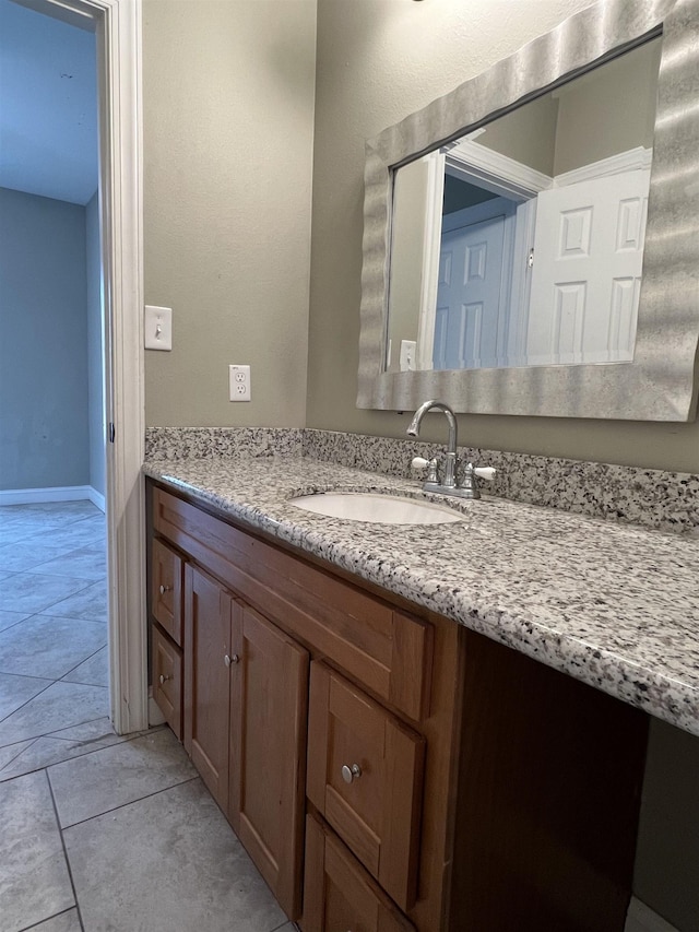 bathroom featuring tile patterned floors and vanity