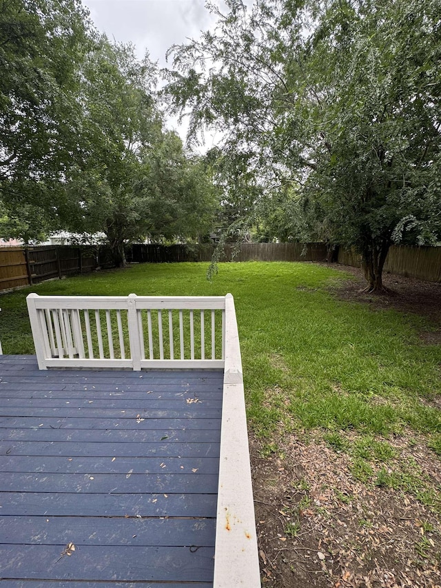 3824 Hays Ave, Groves, TX 77619 - deck with a fenced backyard