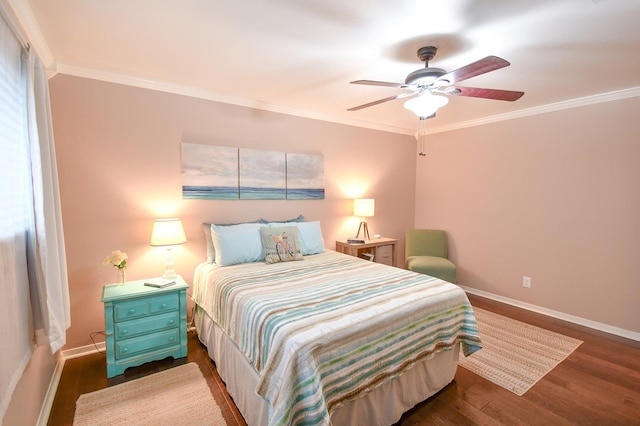 740 Randolph Cir, Beaumont, TX 77706 - bedroom with crown molding, wood finished floors, baseboards, and a ceiling fan