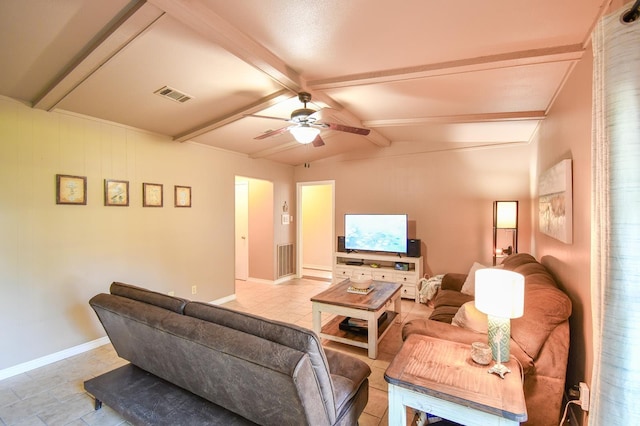740 Randolph Cir, Beaumont, TX 77706 - living area with a ceiling fan, light tile patterned flooring, and baseboards