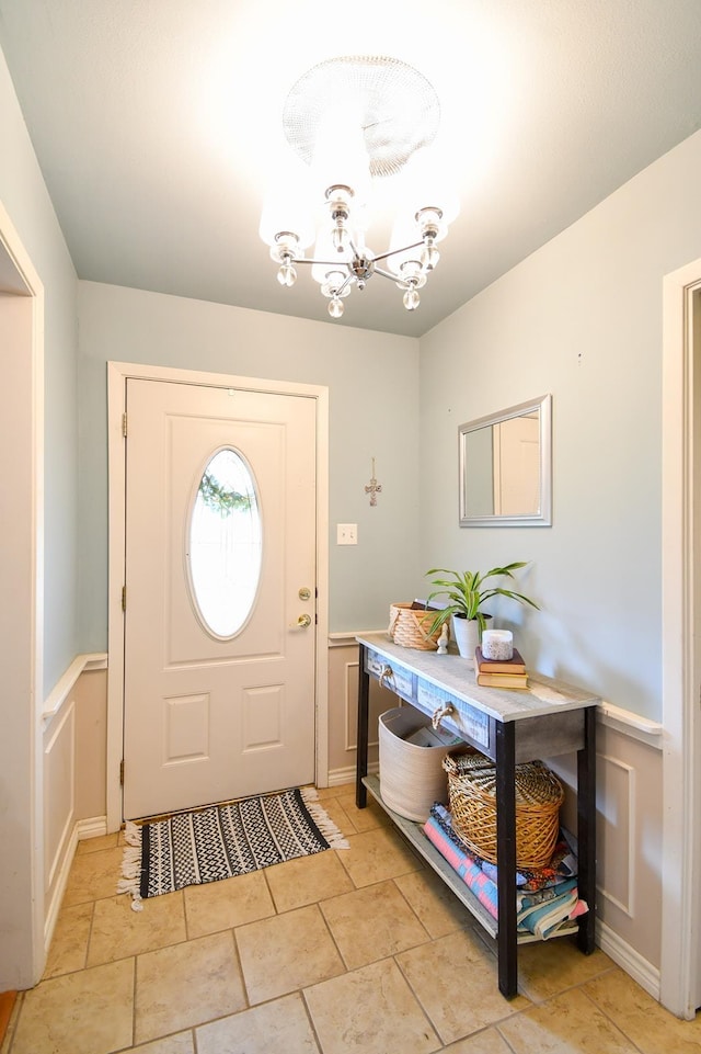 740 Randolph Cir, Beaumont, TX 77706 - foyer entrance with a chandelier and wainscoting