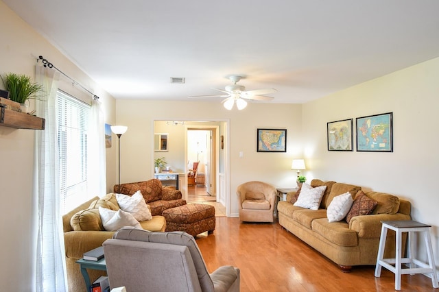 740 Randolph Cir, Beaumont, TX 77706 - living area with a ceiling fan and light wood-type flooring