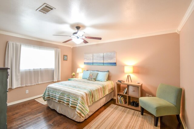 740 Randolph Cir, Beaumont, TX 77706 - bedroom with crown molding, baseboards, hardwood / wood-style floors, and a ceiling fan