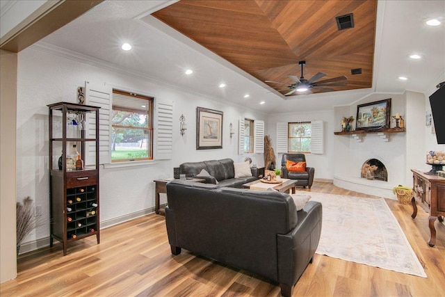 2999 59th St, Port Arthur, TX 77640 - living area featuring wood ceiling, ornamental molding, plenty of natural light, light wood-type flooring, and a ceiling fan
