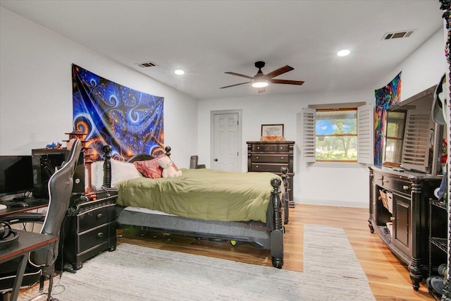 2999 59th St, Port Arthur, TX 77640 - bedroom with wood finished floors, recessed lighting, baseboards, an office area, and ceiling fan