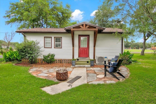 2999 59th St, Port Arthur, TX 77640 - view of front facade with a front yard and ac unit