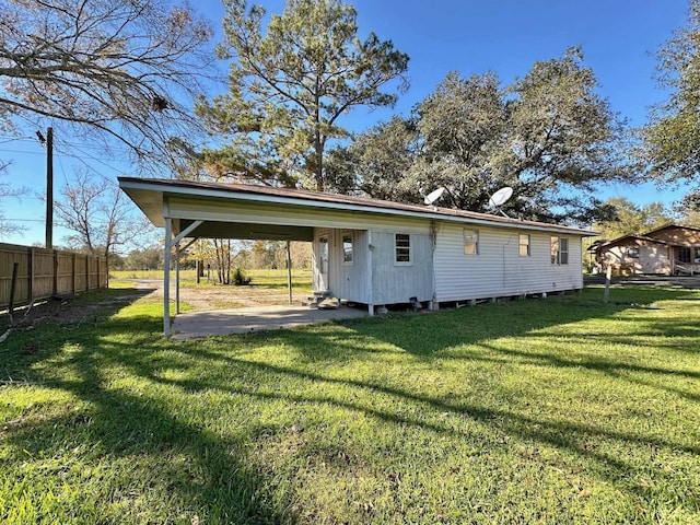 exterior space featuring a carport