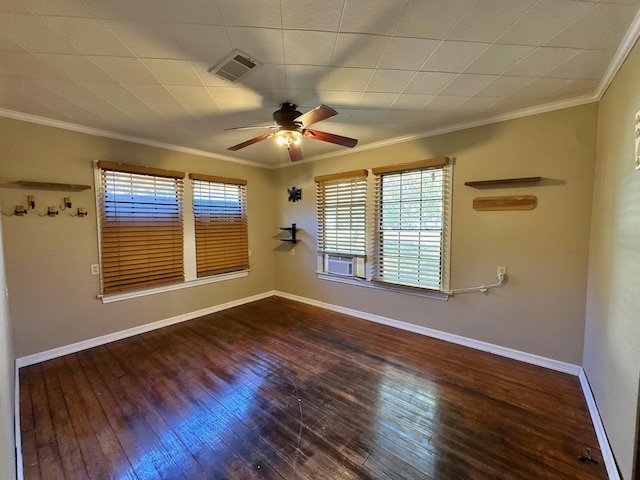 spare room with dark hardwood / wood-style floors, ceiling fan, ornamental molding, and cooling unit