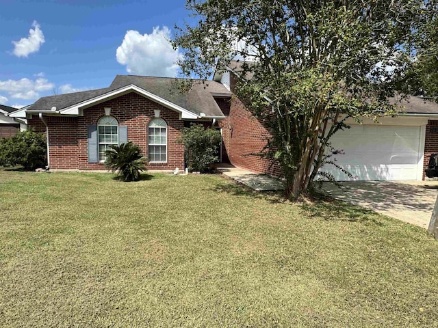 ranch-style house featuring a front yard and a garage