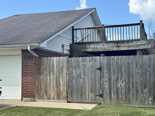 view of side of home with a garage