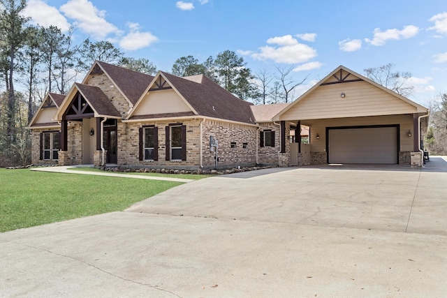 view of front of house with a garage and a front yard