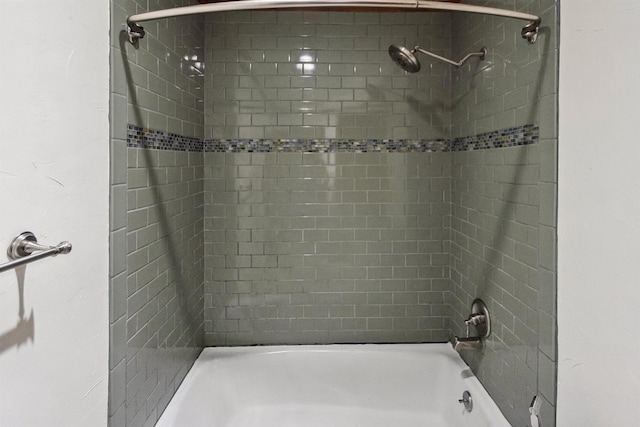 full bath featuring  shower combination