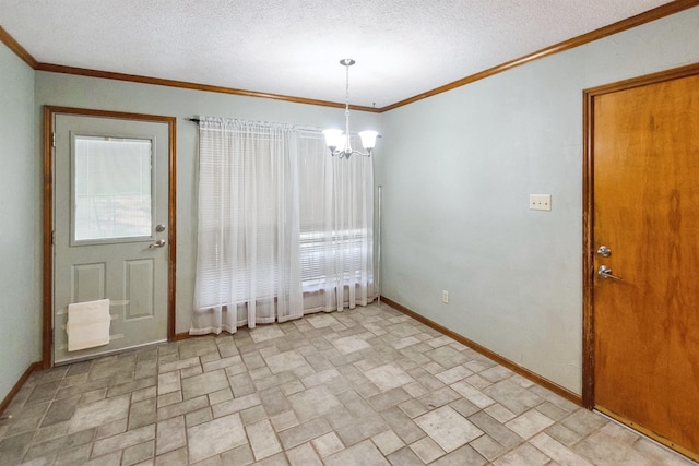 unfurnished dining area with a textured ceiling, a chandelier, stone finish flooring, baseboards, and ornamental molding