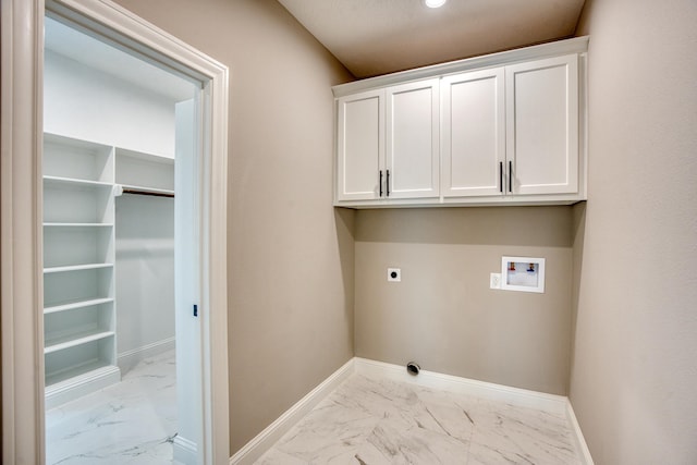 laundry room with cabinet space, baseboards, marble finish floor, hookup for an electric dryer, and washer hookup