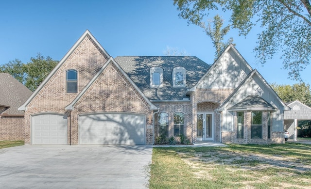 view of front of home featuring brick siding, a shingled roof, concrete driveway, an attached garage, and a front yard